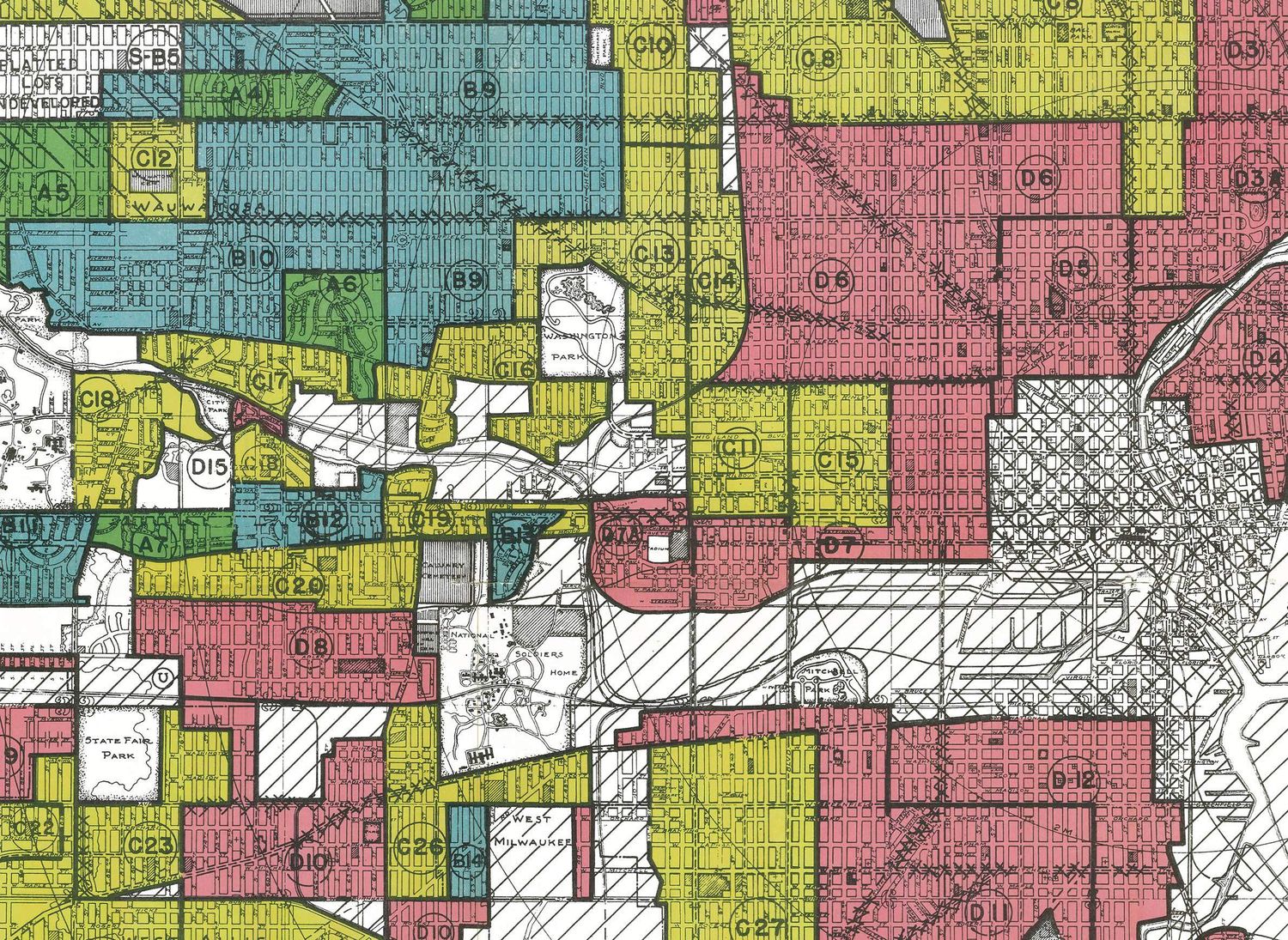 A Home Owners&rsquo; Loan Corporation residential security map with neighborhoods graded and outlined in green, blue, yellow and red.